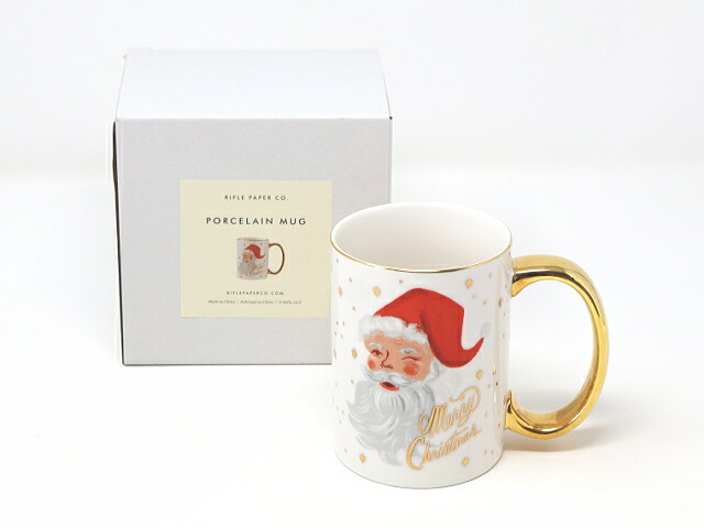 白い紙箱とマグカップを並べたところ。箱にはRIFLE PAPER CO. PORCELAIN MUGと印刷されている