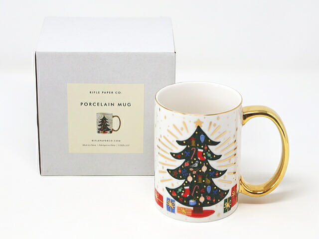 白い紙箱とマグカップを並べたところ。箱にはRIFLE PAPER CO. PORCELAIN MUGと印刷されている